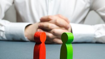 What is the difference between arbitration and litigation in financial services?